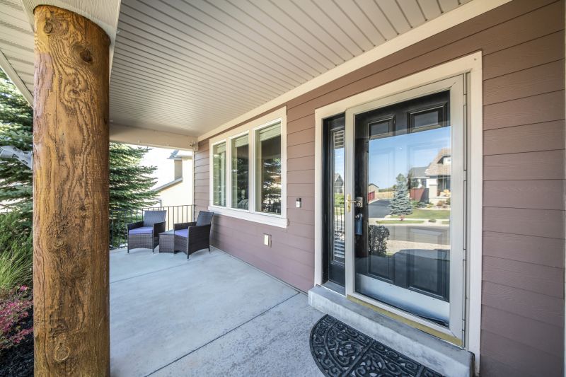 How A Freestanding Porch Installation Enhances Backyard Functionality